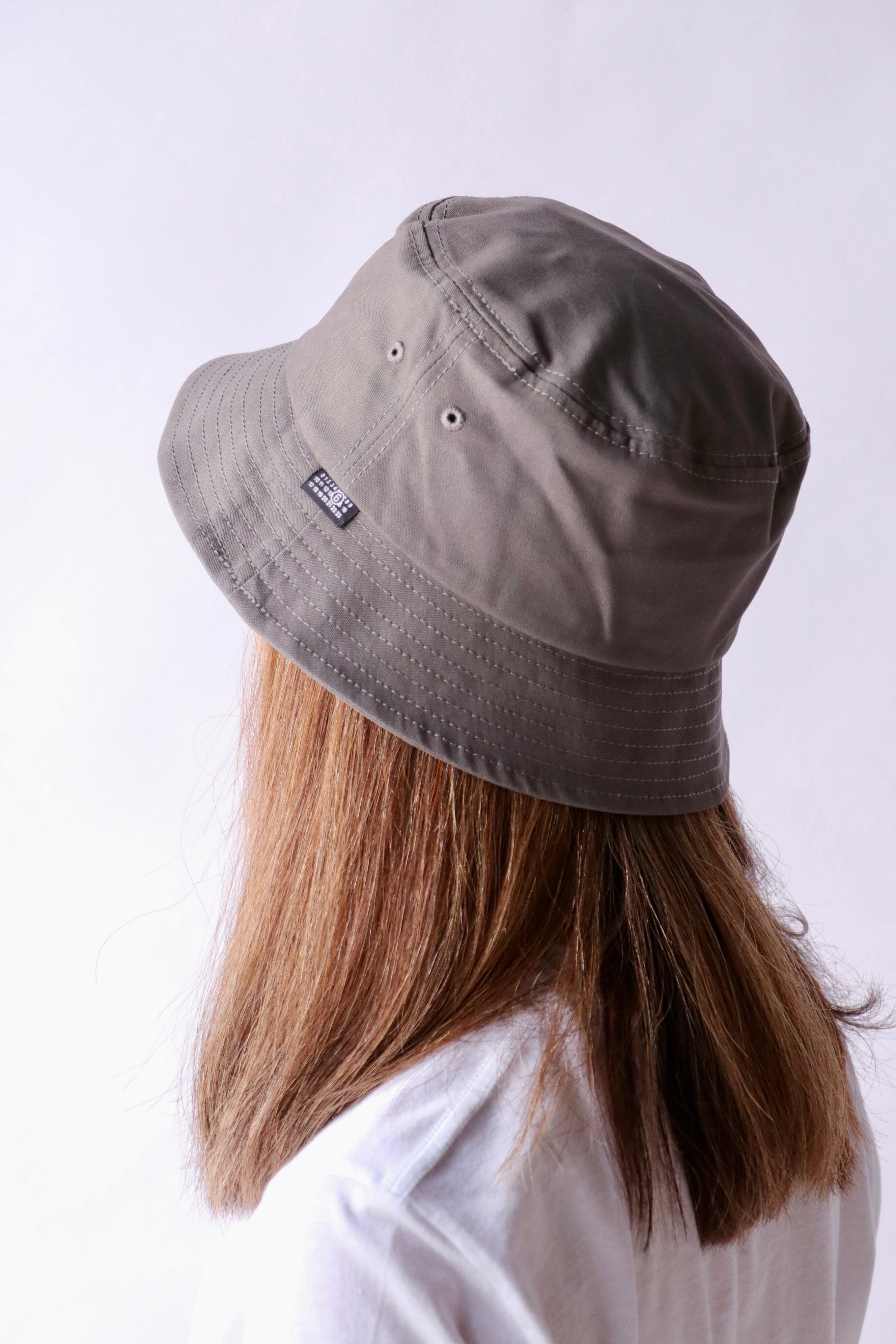 MM6 Maison Margiela Bucket Hat in Grey | WE ARE ICONIC