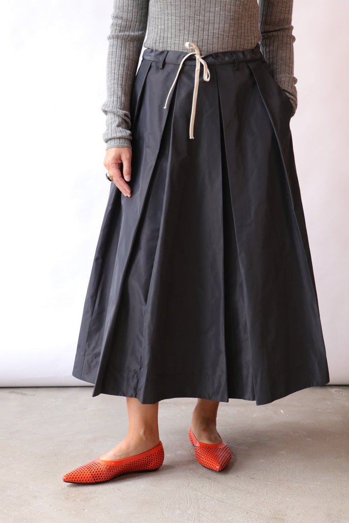 Tela Charlotte Pleated Midi Skirt in Graphite Bottoms Tela 