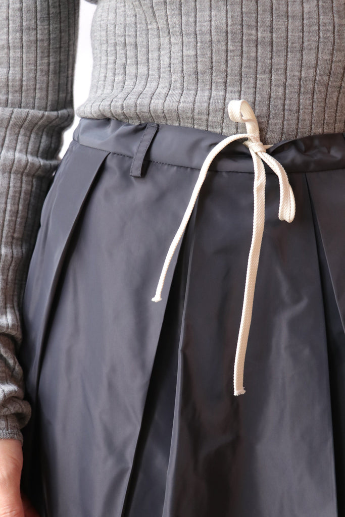 Tela Charlotte Pleated Midi Skirt in Graphite Bottoms Tela 