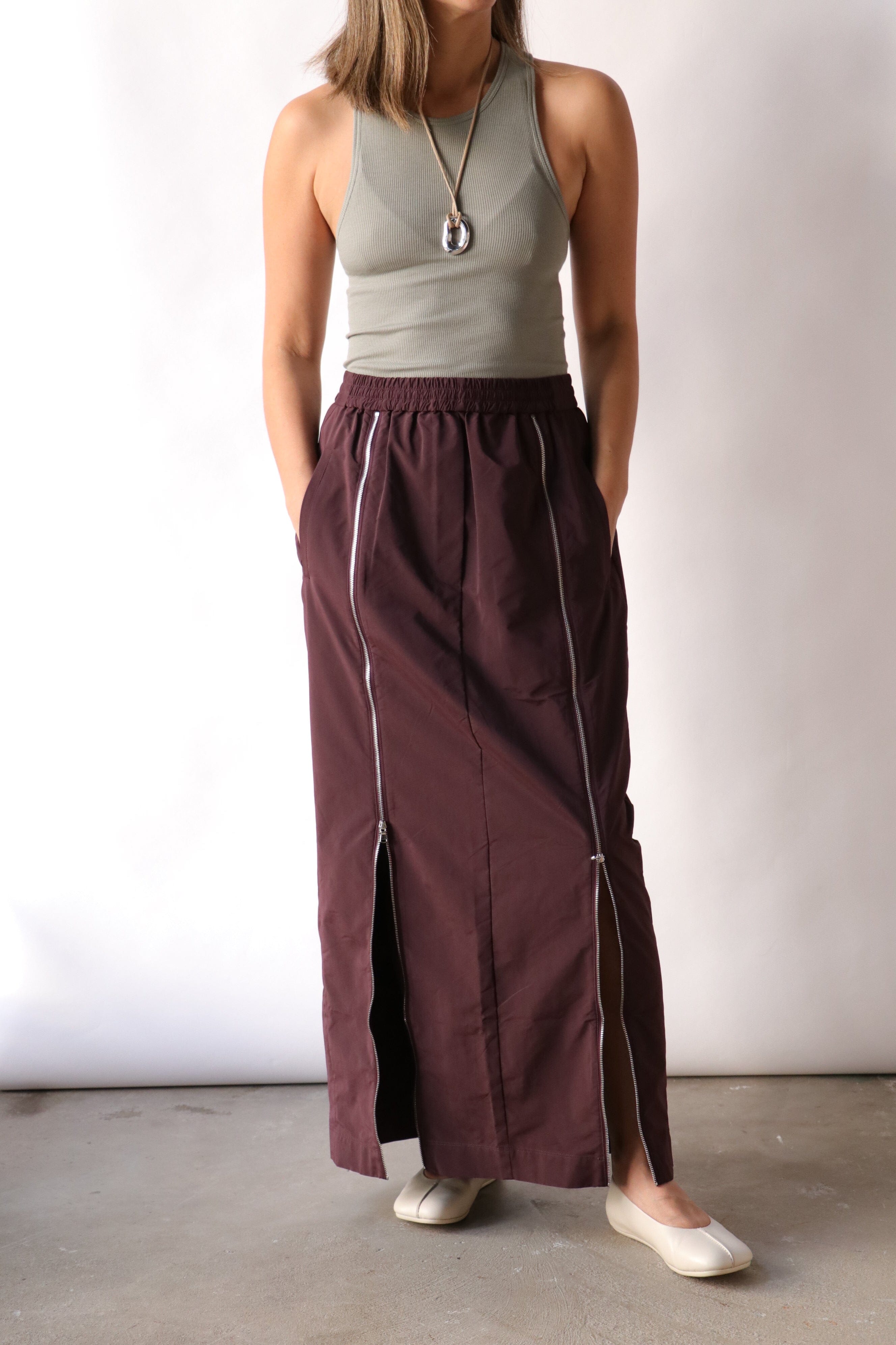 Tibi Nylon Zipper Maxi Skirt in Malbec | WE ARE ICONIC