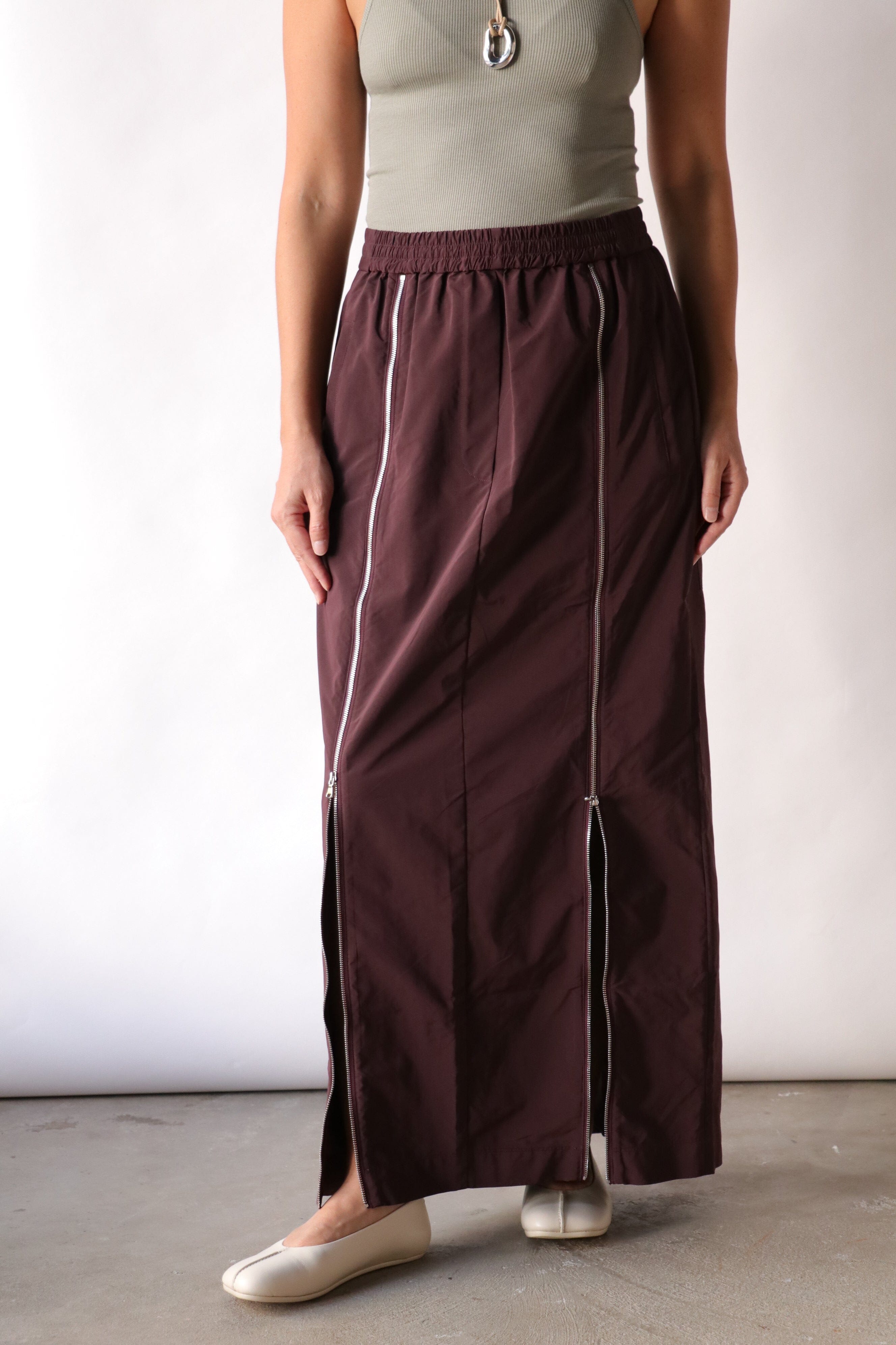 Tibi Nylon Zipper Maxi Skirt in Malbec | WE ARE ICONIC