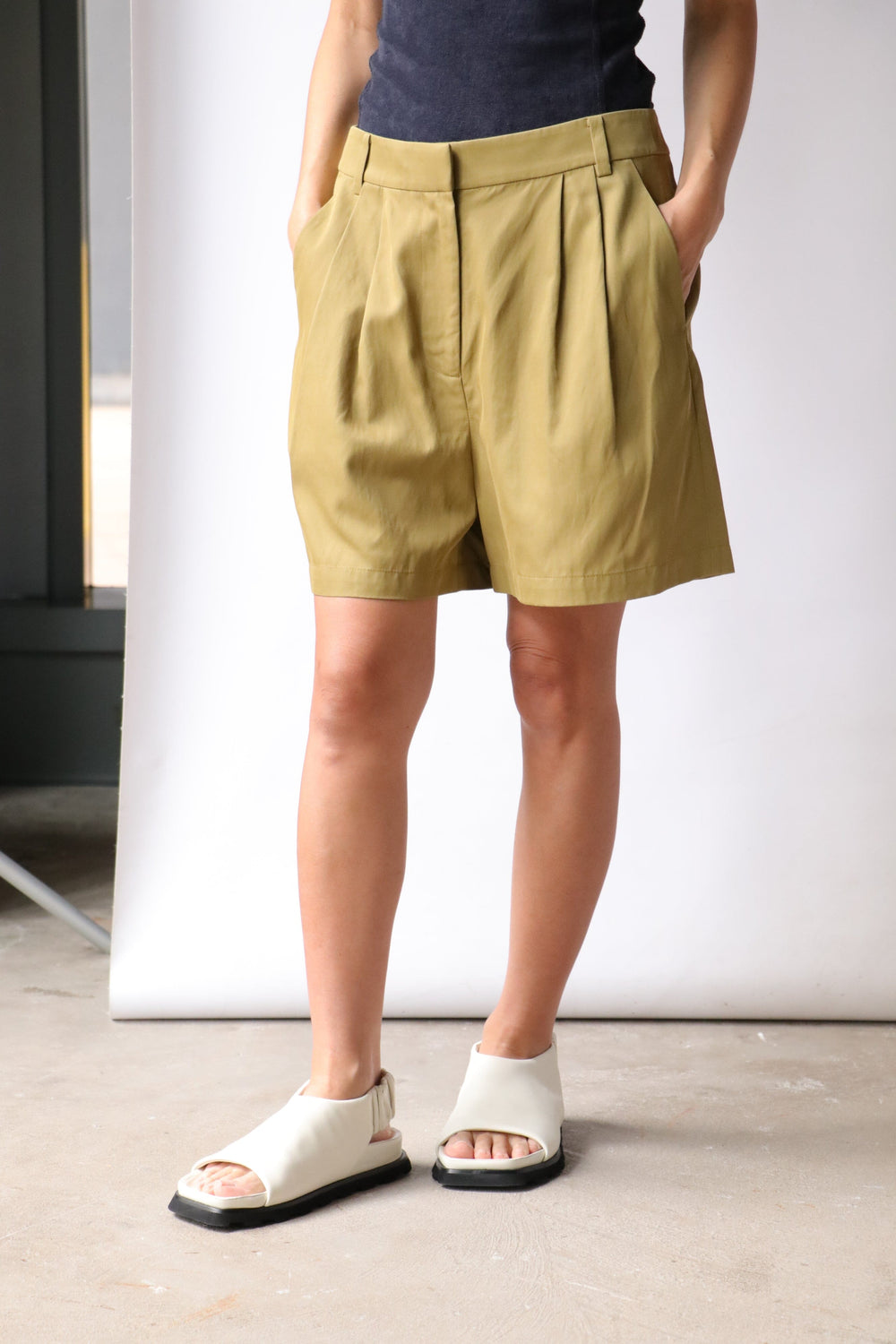 Tibi Drapey Suiting Pleated Short in Cumin | WE ARE ICONIC