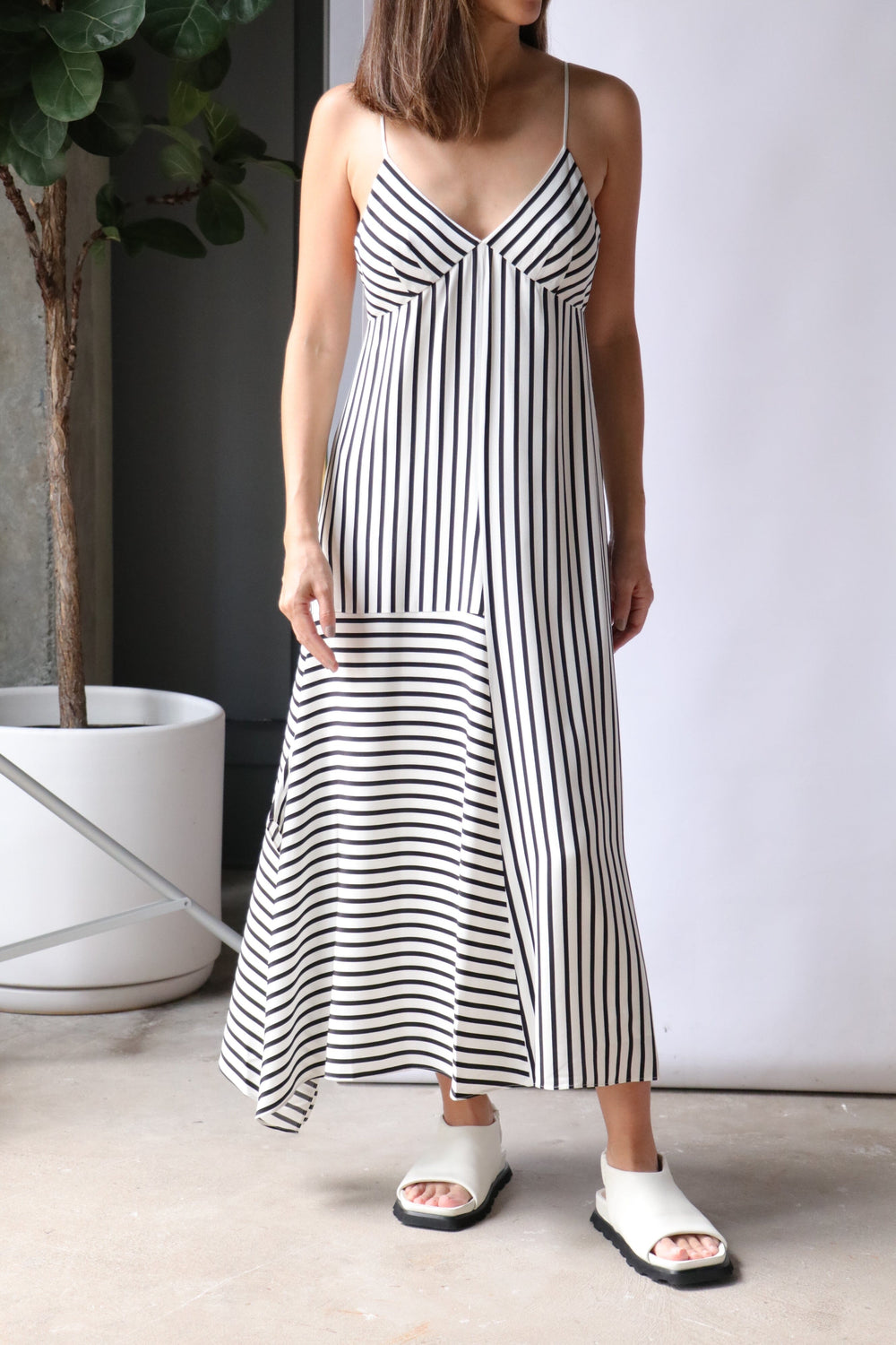 https://shopweareiconic.com/cdn/shop/products/tibi-identity-stripe-cami-dress-in-black-multi-dresses-tibi-308160_1000x.jpg?v=1683875069